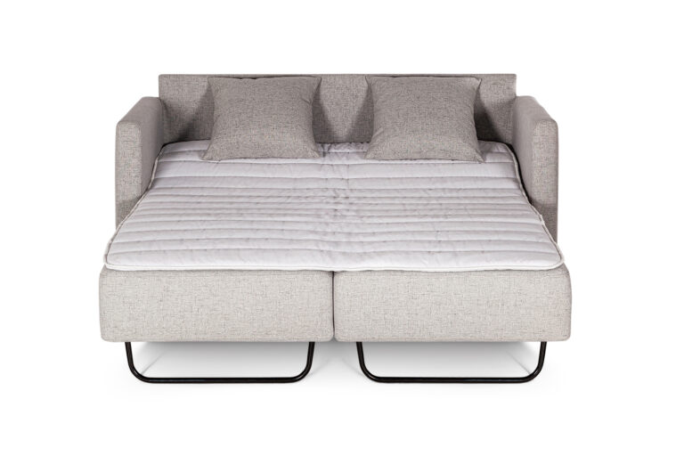 In picture: Nicole 2 opened into bed position. Fabric: Linea 16. Leg: 1, oak.