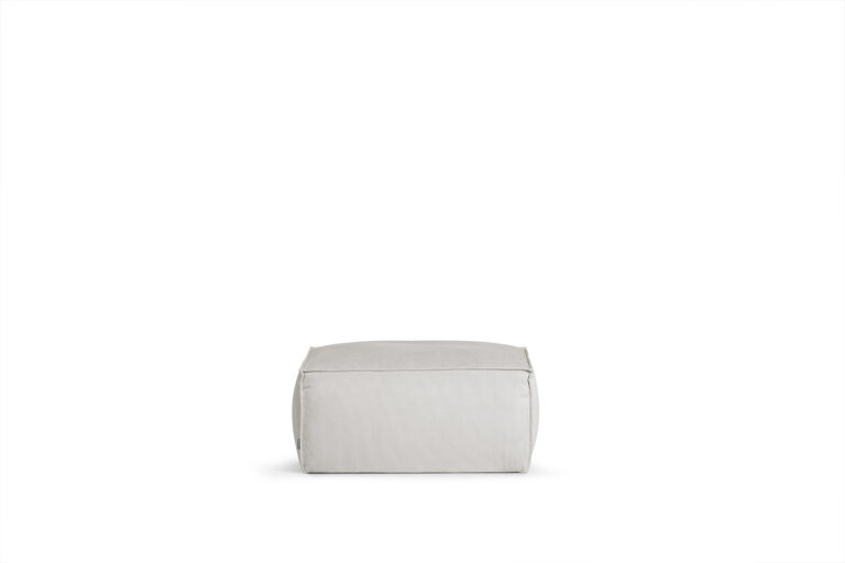 In picture: Robust footstool. Fabric: Wave 50.